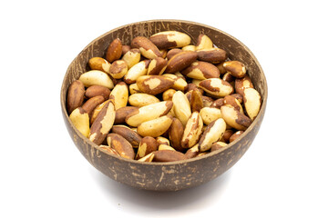 Brazil nut isolated on white background. Brazil nut in bowl. Studio shoot. close up