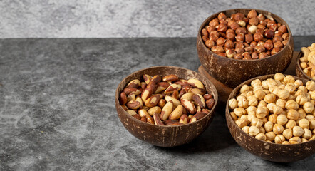 Hazelnuts, cashews and brazil nuts in bowl. Nuts varieties. Empty space for text. copy space