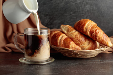 Croissants and coffee with cream.