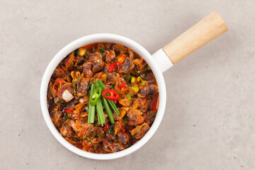 Vegetables mixed with cockles can also be used by lightly blanching them in boiling water.