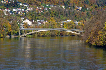 Fototapeta na wymiar Beautiful autumn landscape with bridge over Aare River in the background at Swiss City of Olten on a sunny autumn day. Photo taken November 10th, 2022, Olten, Switzerland.