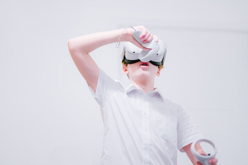 Young teenager wearing virtual reality headset