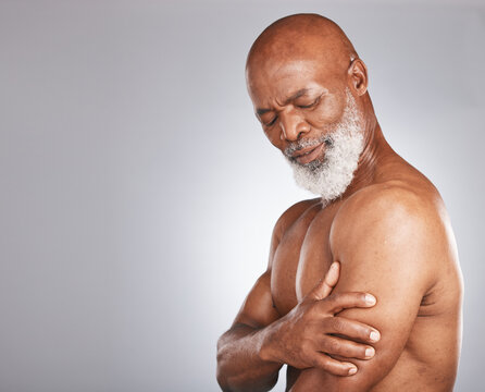 Arm Pain, Injury And Senior Black Man With Muscle Inflammation, Body Accident And Broken Bone On Studio Background. Healthcare, Anatomy And African Elderly Model With Painful Biceps And Mockup Space