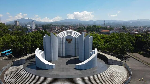 Aerial view of Monument to the Struggle (Monumen Perjuangan), Landmark of Bandung, monument with Garuda, Indonesia national emblem and motto, Unity in Diversity (Bhineka Tunggal Ika)