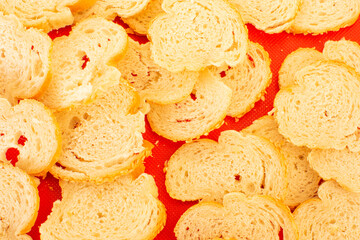 Old light pieces of dry bread. Dried bread slices