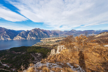 Aerial view of Lake Garda with the Alps, Dolomites and Sarca valley, view from the mountain range of Monte Baldo. Nago-Torbole and Riva del Garda town, Trentino Alto Adige, Italy, Europe.