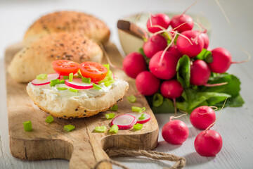 Tasty and healthy sandwich with cherry tomatoes and fromage cheese.