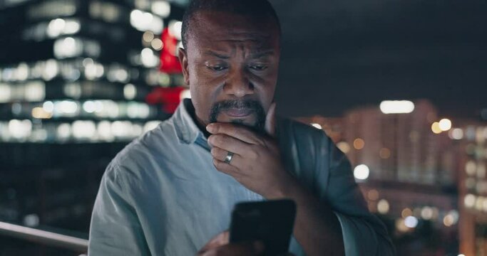Businessman, phone and video call stress at night in New York city with work communication. Mistake, fail and anxiety of mature black man on urban balcony talking on mobile with bokeh lights.