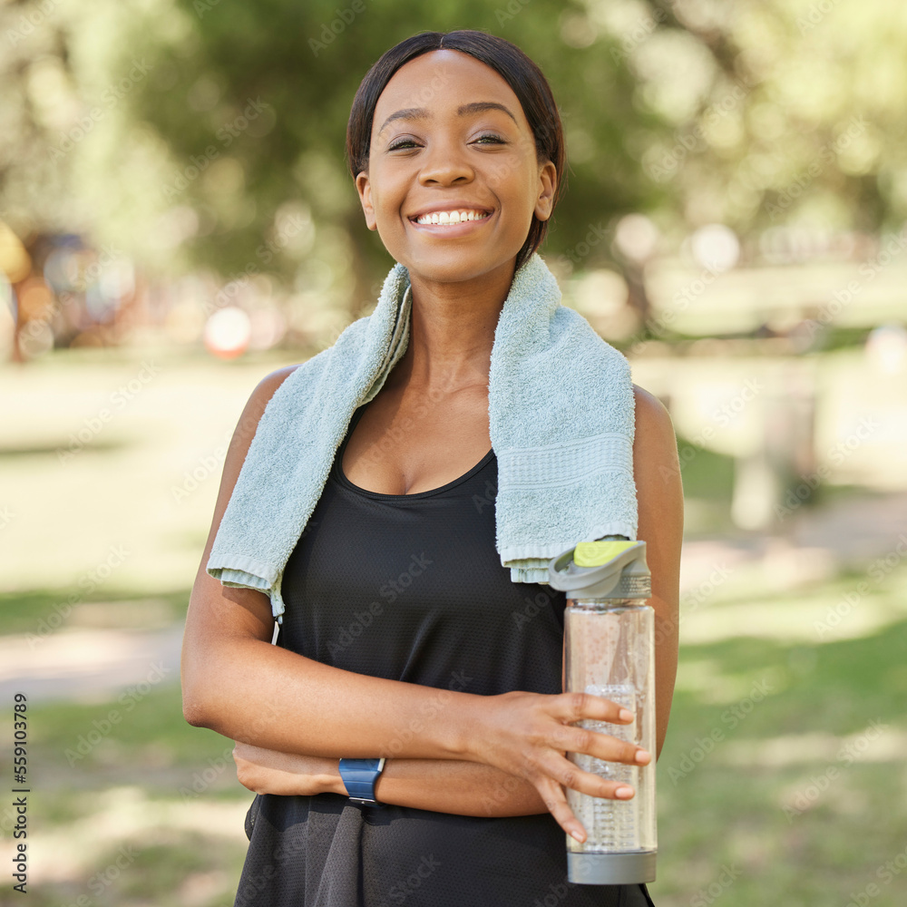 Wall mural Portrait of black woman in park with water and smile in nature for health, fitness goals and healthy mindset. Exercise, zen and yoga, happy face on woman ready for pilates workout training on grass.