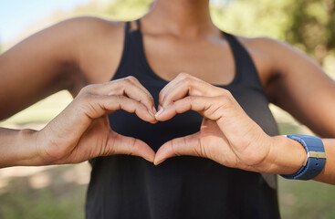 Hands, fitness or black woman in nature with heart sign in training, exercise or park workout in...