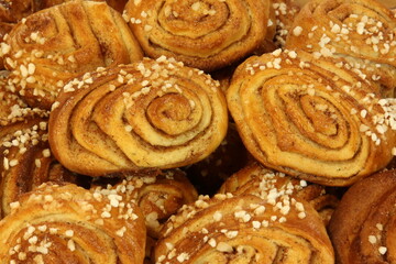 Pile of cinnamon rolls. In Finland it is called Korvapuusti.
