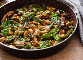 Stir fry chicken, green peas and green beans.. Asian style