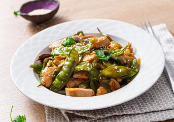 Stir fry chicken, green peas and green beans.. Asian style