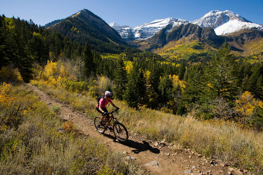 Female mountain biker riding in mountains, Provo, Utah.