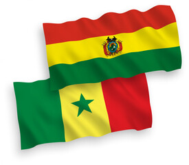 Flags of Republic of Senegal and Bolivia on a white background