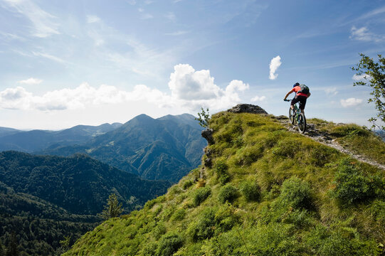 mountain biker on the way uphill, Slatnik, Istria, Slovenia