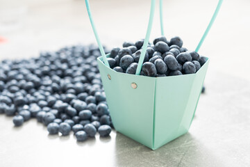 large blueberry with paper basket