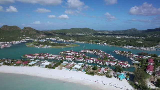 The drone aerial footage of Jolly Beach and Jolly Harbour in Antigua. Jolly Harbour is a township on Antigua Island, in Antigua and Barbuda.