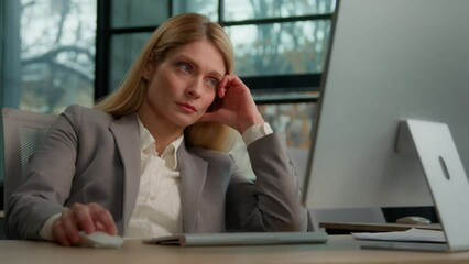 Tired lazy adult middle-aged woman female manager employee worker bored at work project online in computer in office Caucasian mature ill businesswoman need energy asleep feel overworked exhaustion