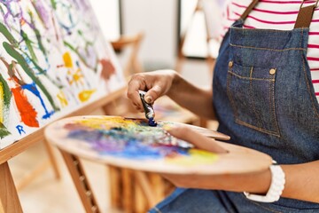 Fototapeta premium Young woman drawing at art studio