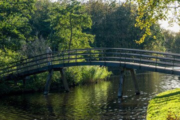 Netherlands, Hague, Haagse Bos, a bridge over a body of water
