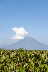 Fototapeta premium Chaparrastique volcano seen from Laguna Olomega in San Miguel, El Salvador