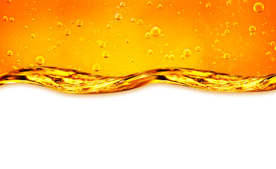 Liquid flows yellow, for the project, oil, honey, beer or other variants. Oil background.  - 559128370