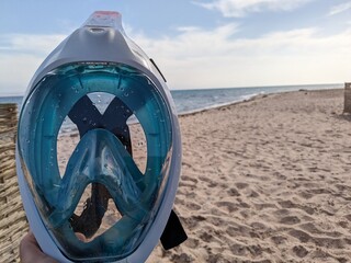 mask for snorkeling on the background of the sea coast
