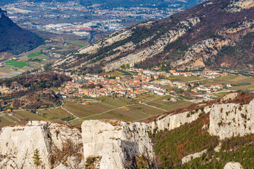 Aerial view of the small village of Nago-Torbole view from the mountain range of Monte Baldo (Monte...