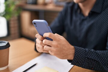 Young caucasian man business worker using smartphone working at office