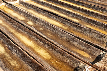 Wooden trays for the sea salt production in Amed, Bali