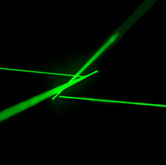 Green laser show nightlife club. Royalty high-quality stock photo of luxury entertainment with Bright laser and black background in nightclub event, festival. Beams and rays shining colorful lights
