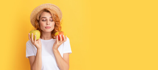 Summer girl hold apple. woman in straw hat eating healthy food. youth health. natural organic fresh apple. Beauty woman isolated face portrait, banner with mock up copy space.