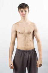 Fototapeta premium A shirtless 17 year old muscular boy