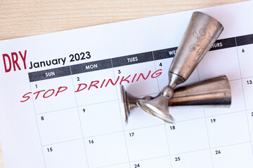 Calendar marked to indicate that January is Dry January - a month to stop drinking and alcohol-free.