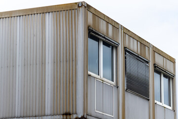 old industrial building facade with windows