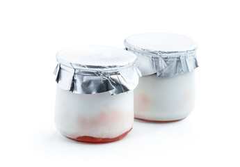 Fresh natural homemade organic yogurt in a glass jars isolated on white