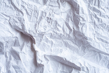 White crumpled paper as a background.	