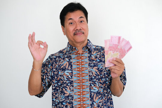 Man showing some cash money with happy expression