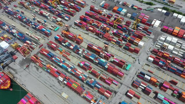Aerial view of sea freight, Cargo ship, Cargo container in factory harbor at industrial estate for import export around in the world, Trade Port / Shipping - cargo to harbor	