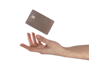 Hand and flying gold credit debit card, blank template, mockup for bank cashback advertisement isolated on white