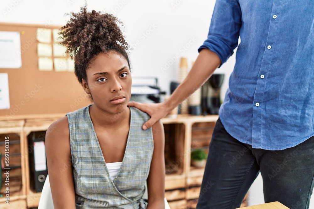 Wall mural man and woman business workers on sexual harassment concept at office