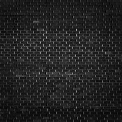 Rough black brick wall texture or background