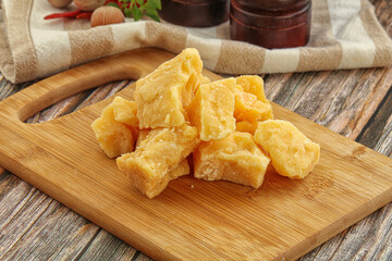 Crushed hard parmesan cheese pieces