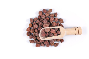 Brown chickpea (Kala Chana, Black Chana, Black Chick Pea). Chick pea with wooden spoon