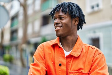 Fototapeta premium African american man smiling confident standing at street