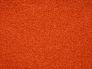 Orange felt texture. Saturated background for Christmas desktop, holiday New Year, xmas seasonal decoration, valentin day, text, lettering, patchwork or, party greeting and wedding card element.