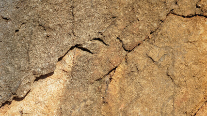 Natural rocky stone texture with cracks