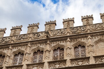 Fototapeta na wymiar Interior facade of the Lonja de la Seda in Valencia in Gothic style with gargoyles