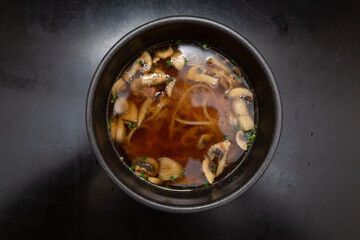 Chinese soup with mushrooms and noodles